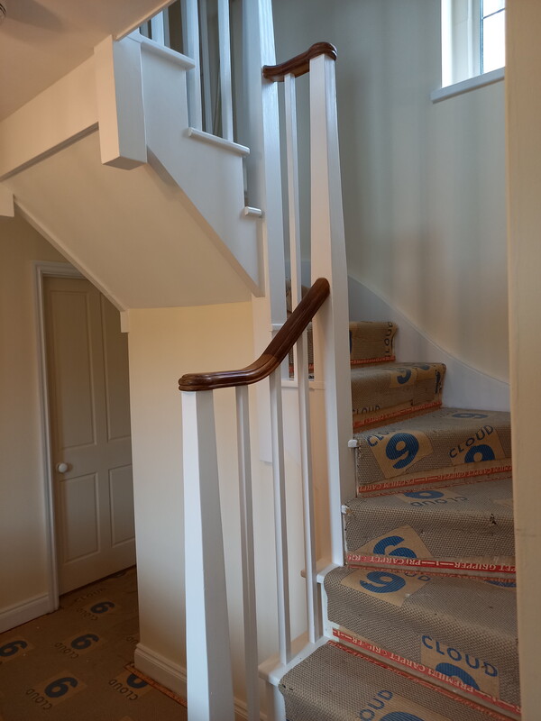 Freshly-painted white banisters.